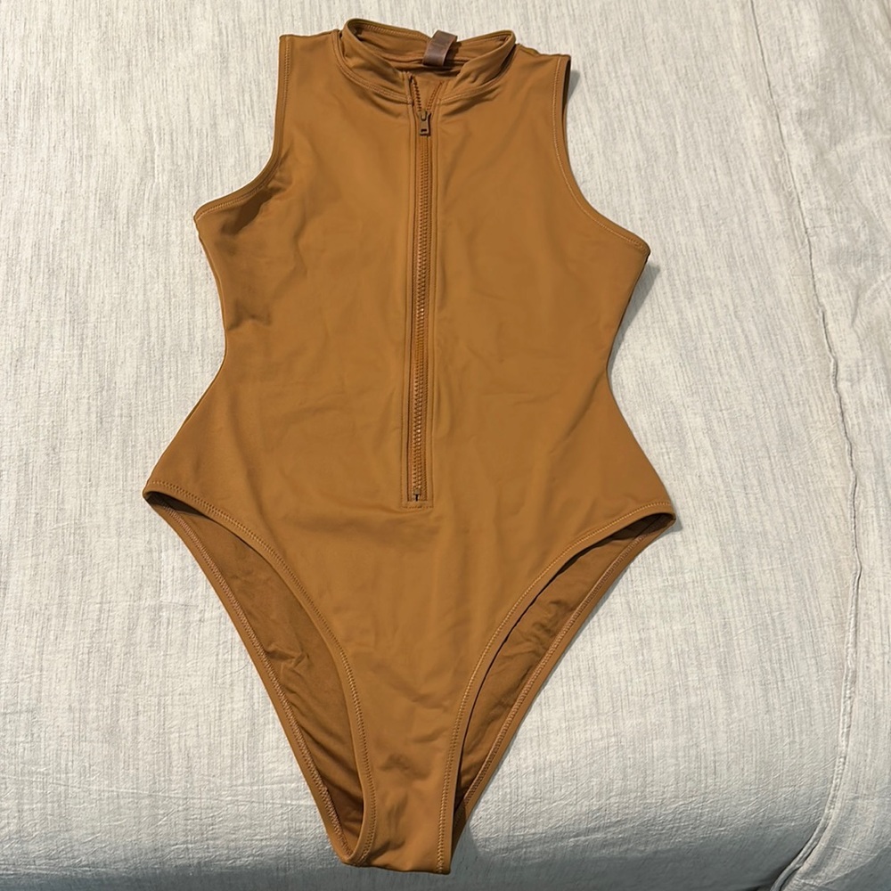 Skims one piece bathing suite